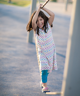 elpa-early-learning-photographers-australia-Girl balancing playground